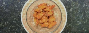 Alitas crujientes cubiertas con salsa mango habanero